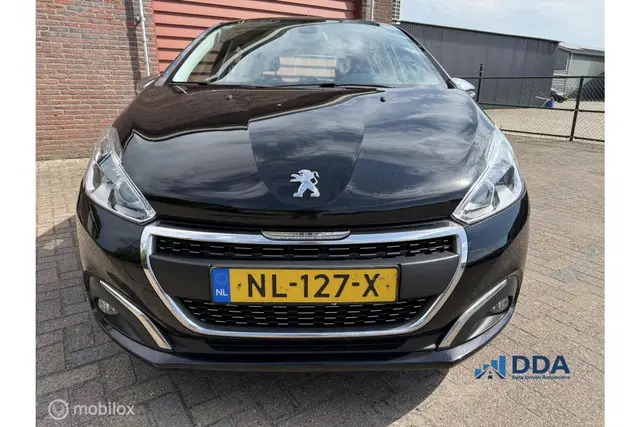 Peugeot 208 1.2 PureTech Executive | Clima · Cruise | Navi (2017) — foto 2