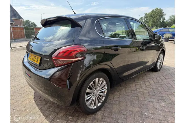 Peugeot 208 1.2 PureTech Executive | Clima · Cruise | Navi (2017) — foto 5
