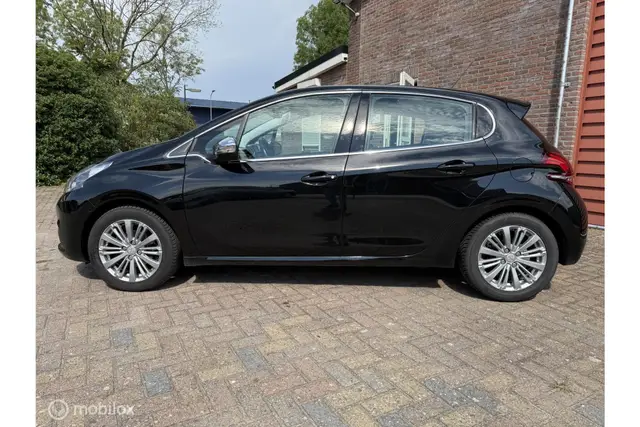 Peugeot 208 1.2 PureTech Executive | Clima · Cruise | Navi (2017) — foto 9
