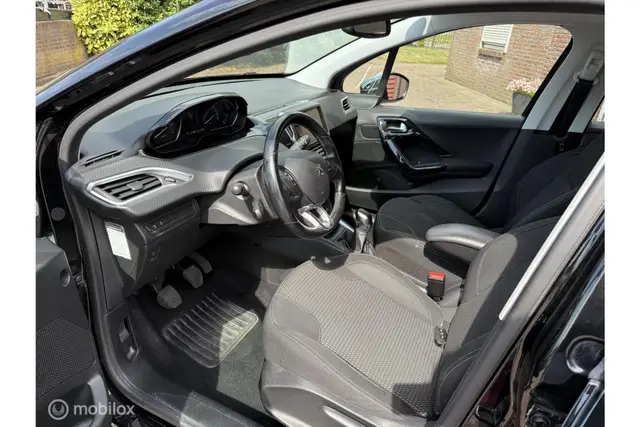Peugeot 208 1.2 PureTech Executive | Clima · Cruise | Navi (2017) — foto 10