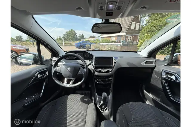 Peugeot 208 1.2 PureTech Executive | Clima · Cruise | Navi (2017) — foto 11
