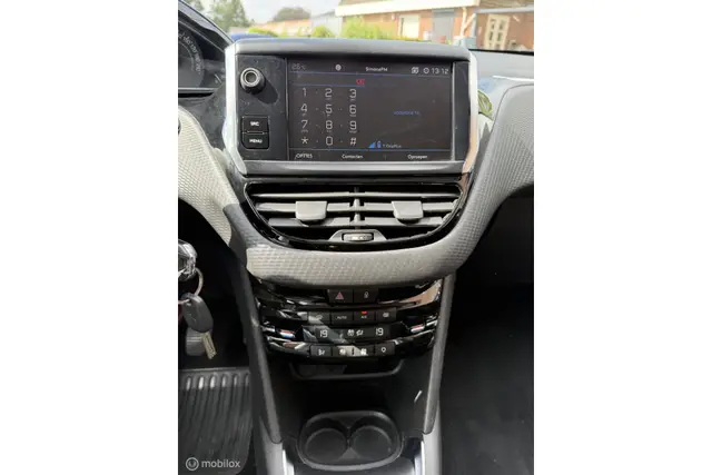 Peugeot 208 1.2 PureTech Executive | Clima · Cruise | Navi (2017) — foto 12