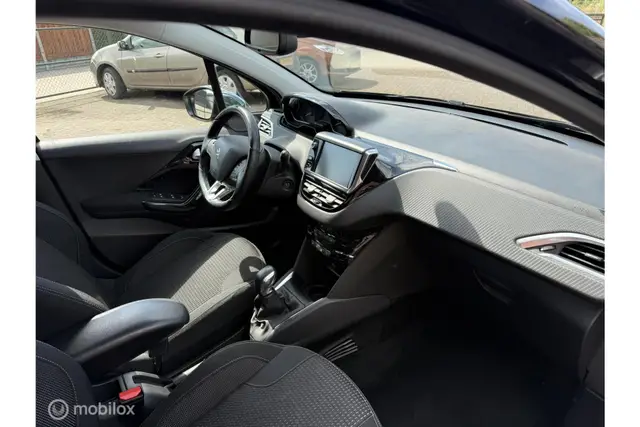 Peugeot 208 1.2 PureTech Executive | Clima · Cruise | Navi (2017) — foto 16